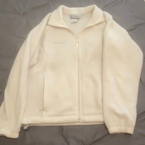 Columbia women’s cream colored size medium semi-fitted fleece jacket.